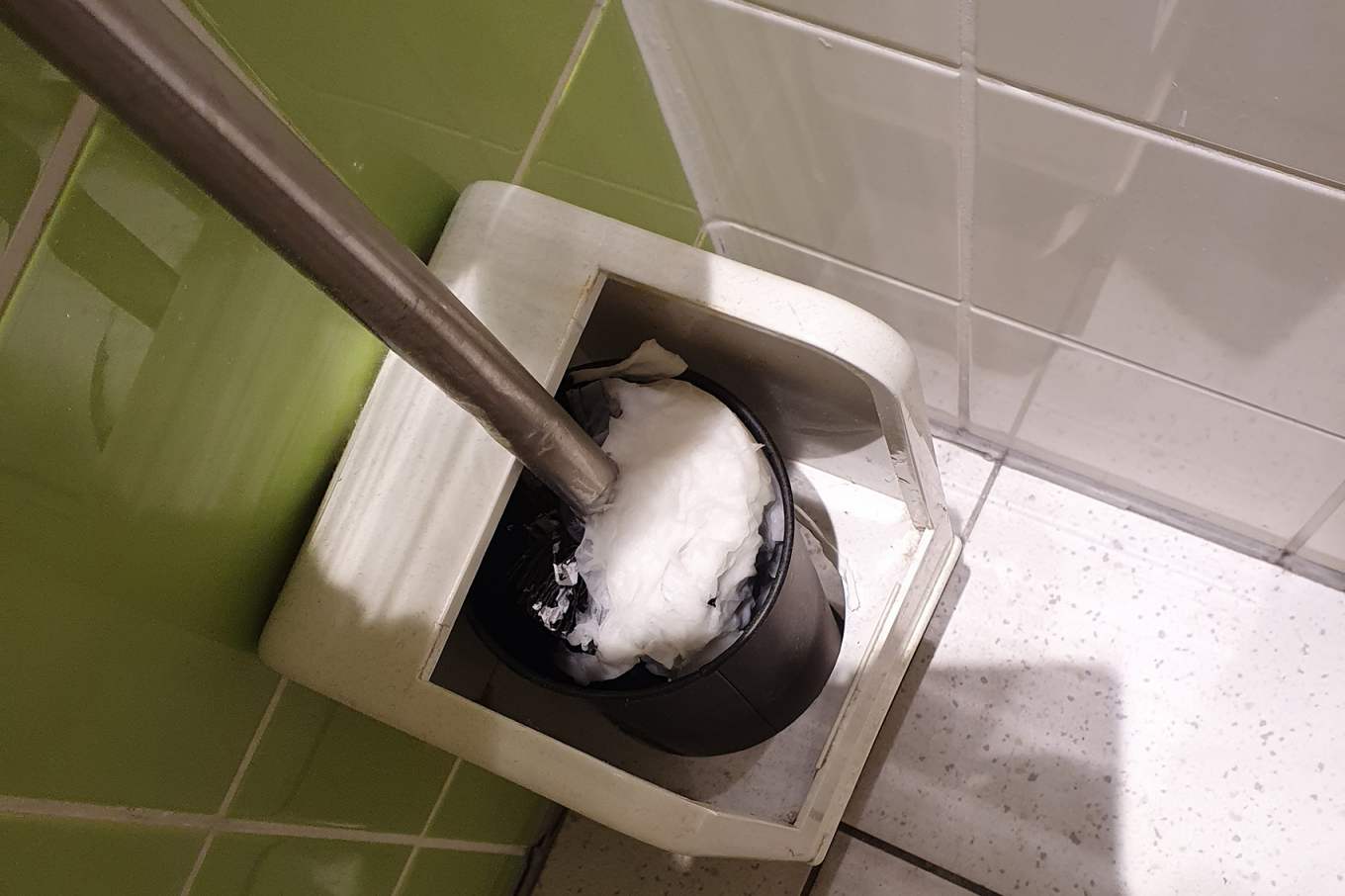 Toiletborstel met papier